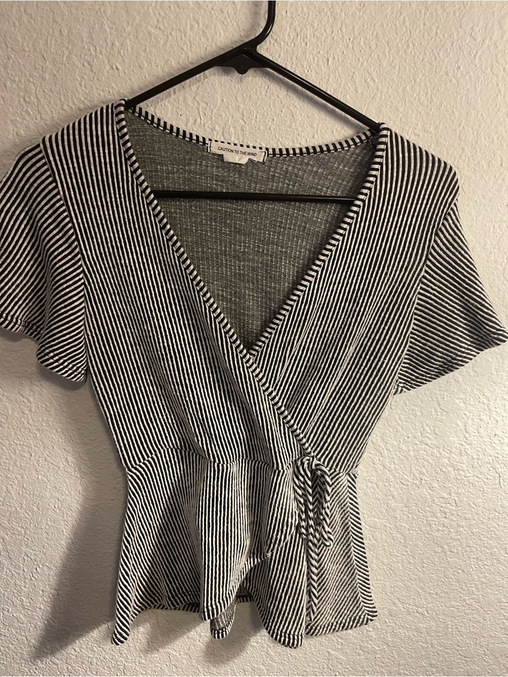 Striped Wrap Peplum Top in Black & White